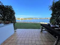 FLAT ON THE SEA FRONT IN ES CASTELL Es Castell